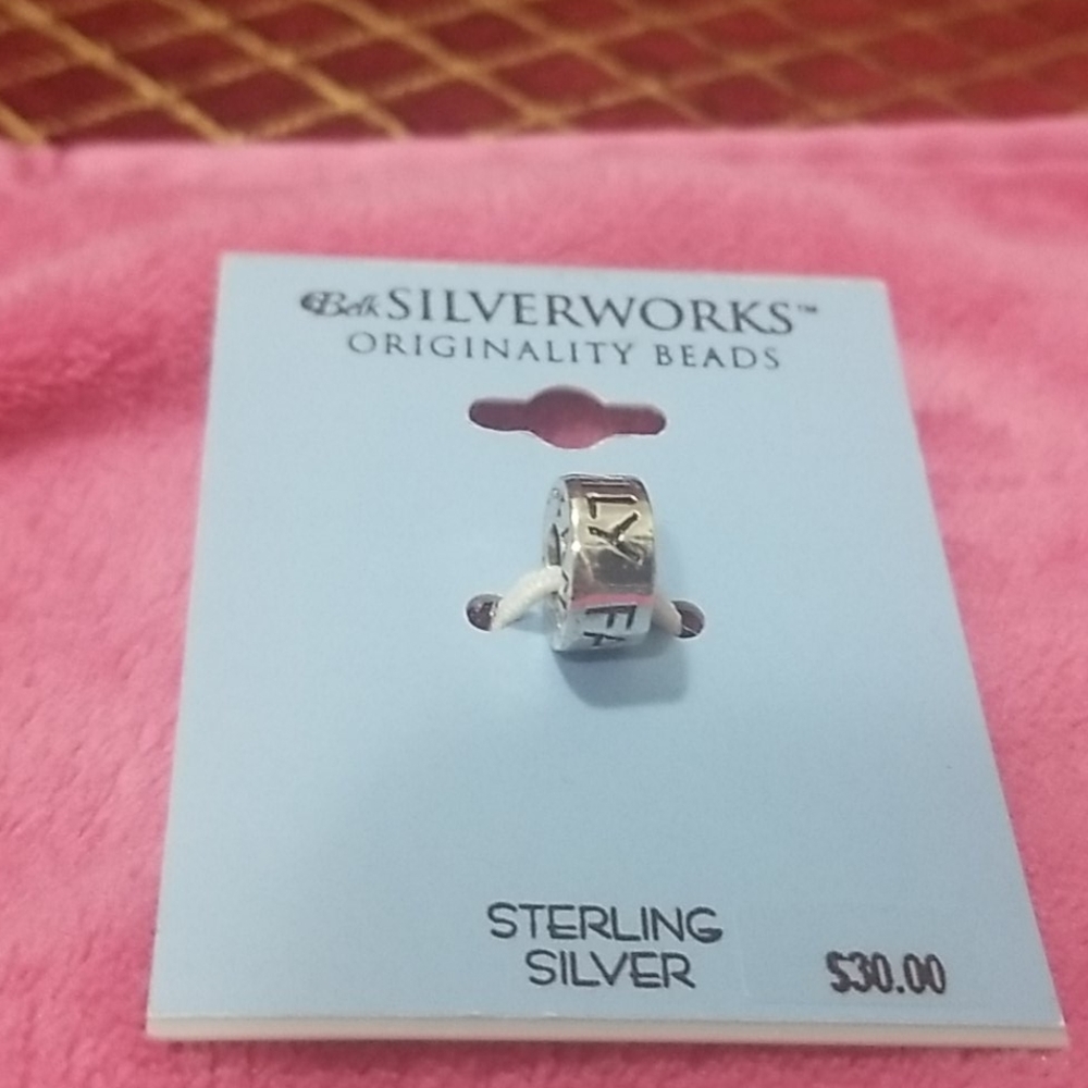 Belk Silverworks sterling  silver FAMILY charm.